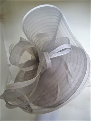 Silver fascinator with a large wave and bow