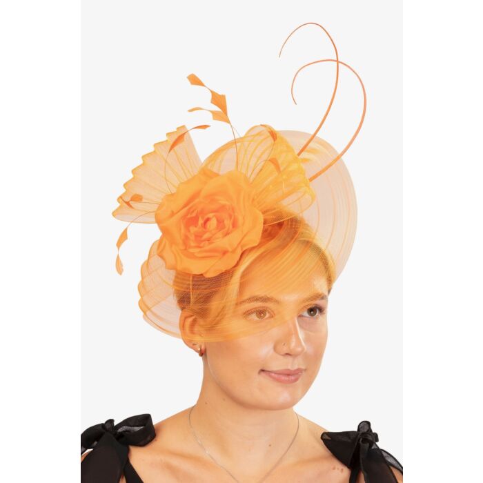 Pleated orange crin fascinator, with a rose, fine feathers and quills